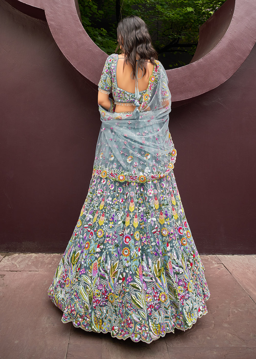 Carnation Blue Net Lehenga Choli Adorned with Cut-Dana & Handwork Embroidery: The Bride's Edit