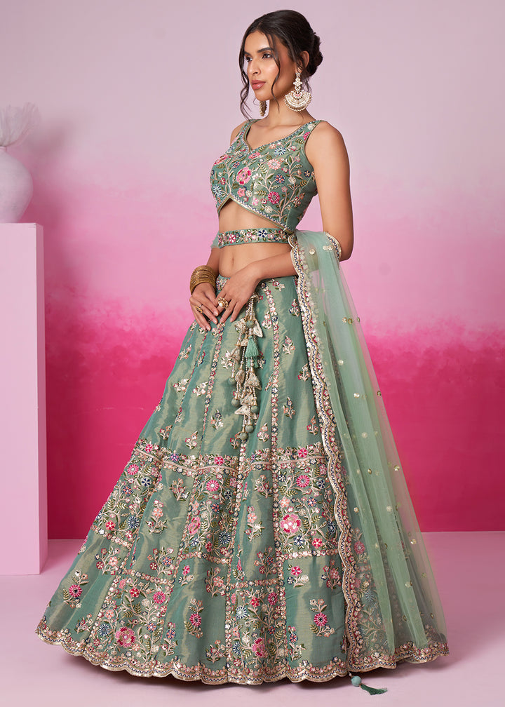 Pistachio Green Net Lehenga Choli Adorned with Moti & Sequins Embroidery Work