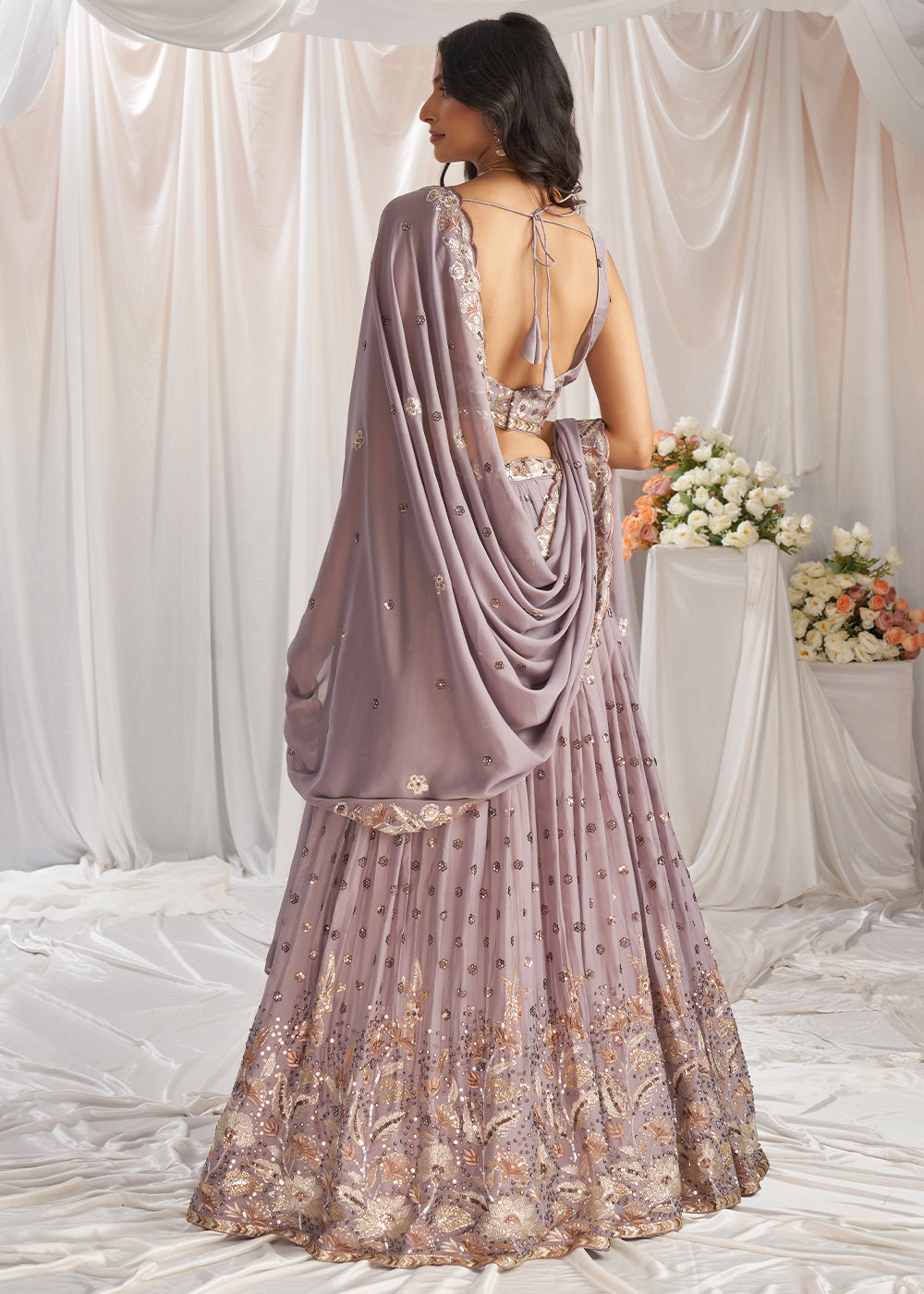 African Purple Georgette Lehenga Choli Adorned with Sequins Work