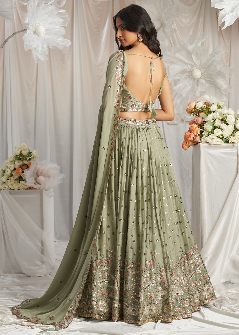 Clover Green Georgette Lehenga Choli Adorned with Sequins Work