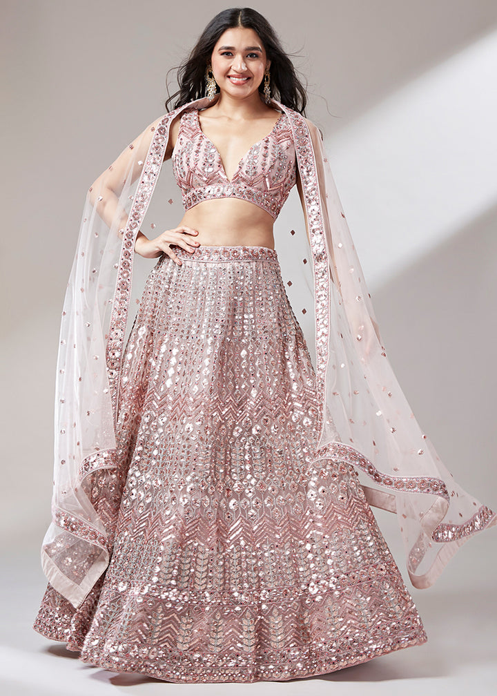 Rose Gold Pink Net Lehenga Choli Highlighted with Sequins Embroidery & Net Mirror work