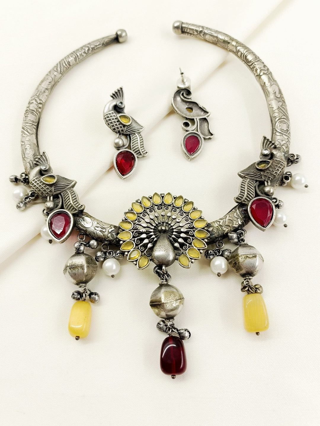 Padmavati Yellow Peacock Oxidized Hasli Style Necklace Set
