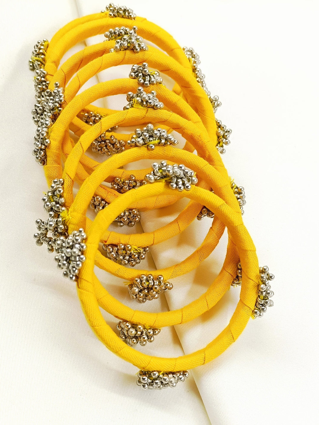 Pranjal Yellow Fabric Bangles with Ghungroo