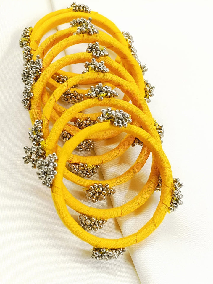 Pranjal Yellow Fabric Bangles with Ghungroo
