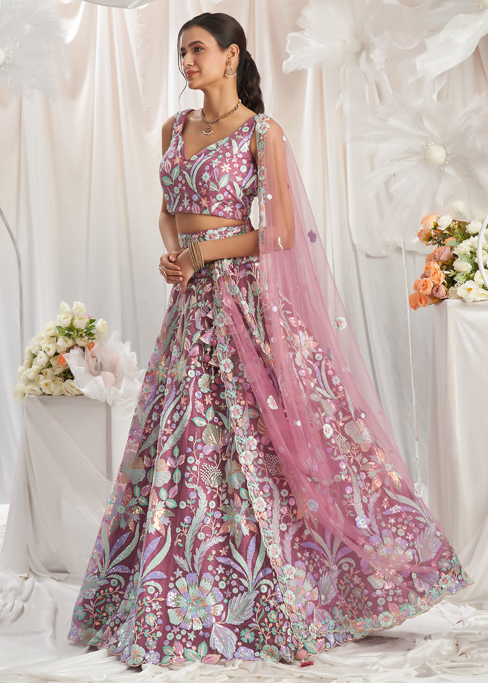 Wildberry Purple Net Lehenga Choli Adorned with Sequins Embroidery Work