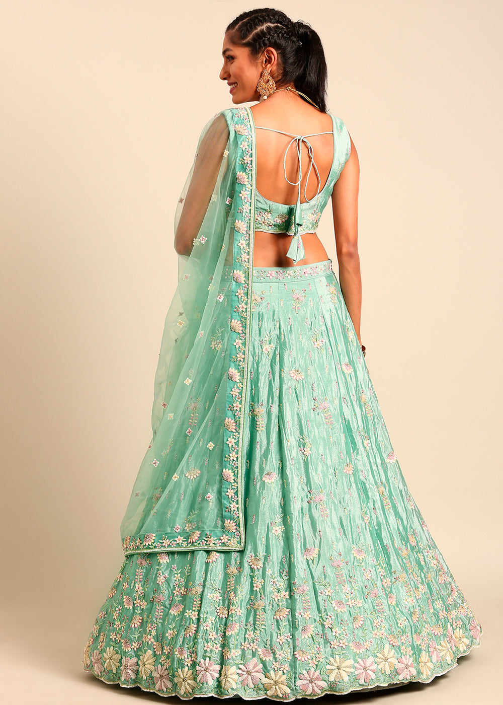 Pistachio Green Net Lehenga Choli Highlighted with heavy Sequins Embroidery