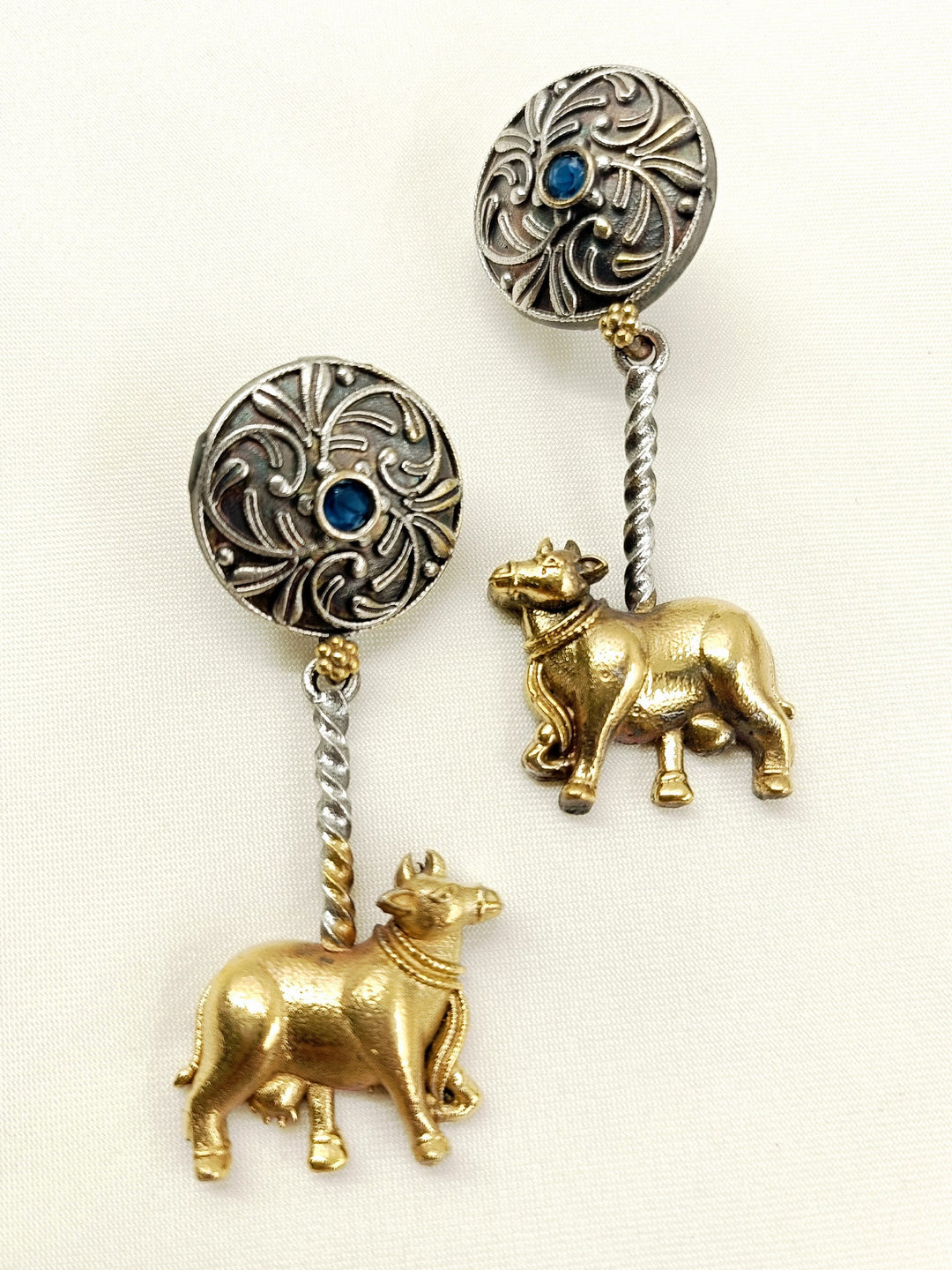 Liya Blue Cow Oxidized Earrings