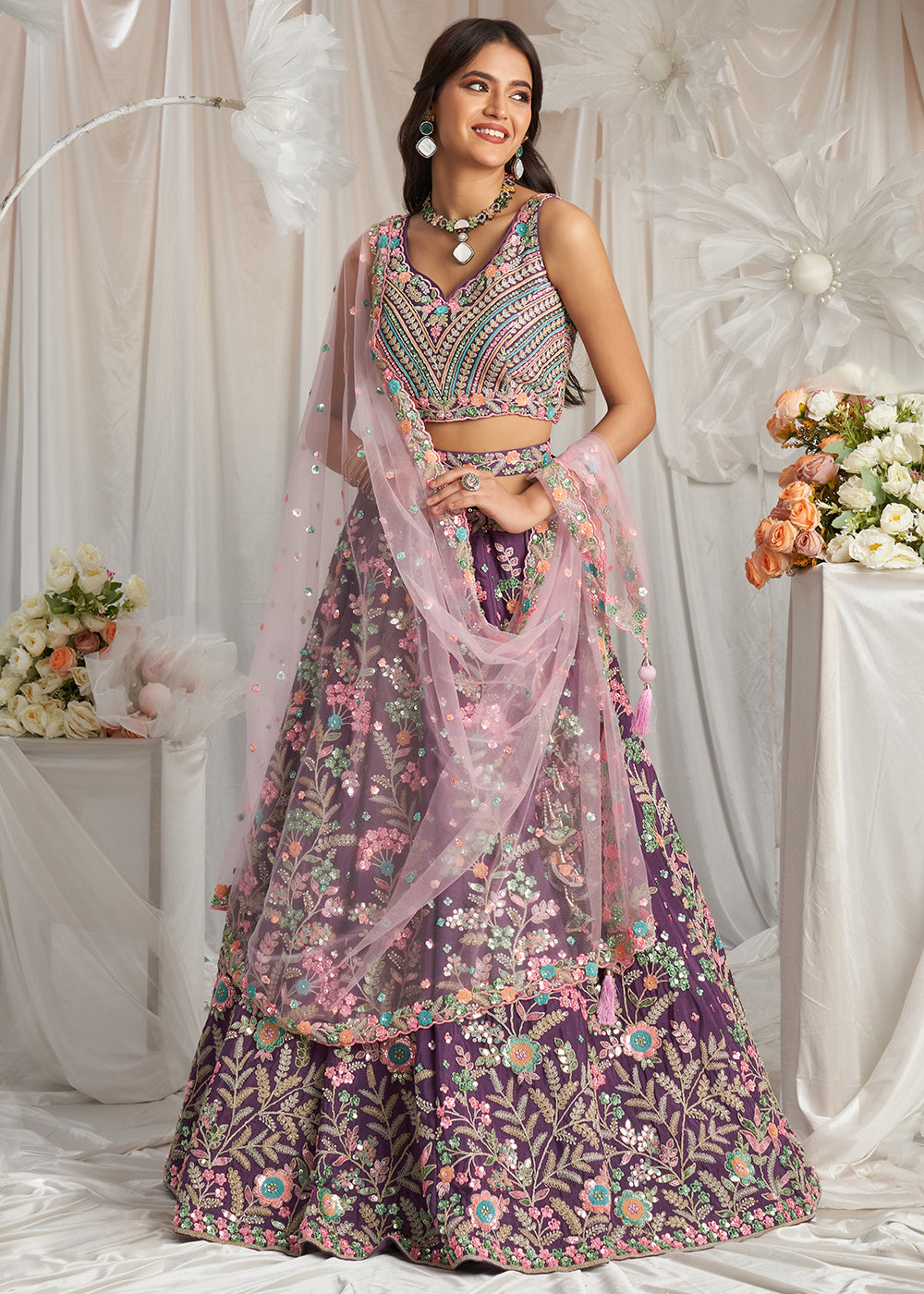 Pomegranate Purple Georgette Lehenga Choli Adorned with Sequins Embroidery