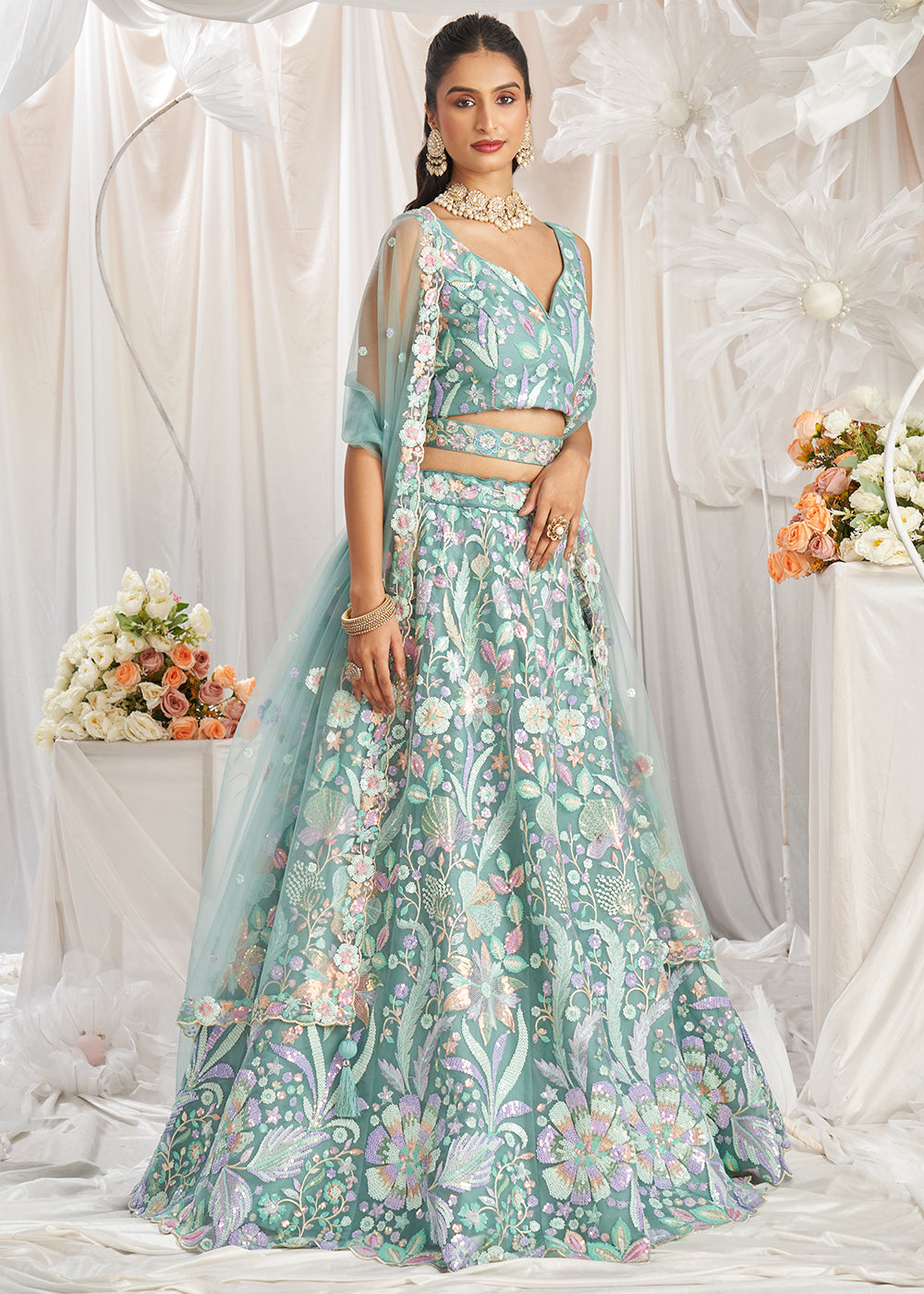 Greenish Blue Net Lehenga Choli Adorned with Sequins Embroidery Work