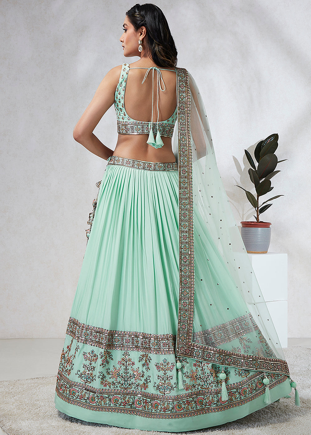 Mint Green Georgette Lehenga Choli Highlighted with Sequins & Thread Embroidery