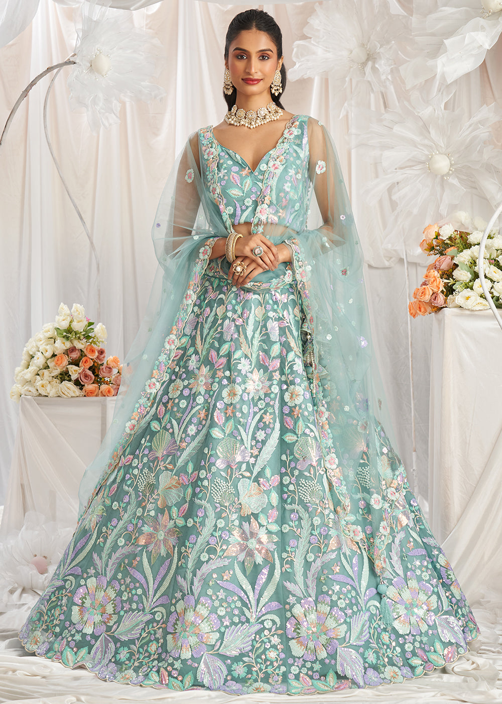 Greenish Blue Net Lehenga Choli Adorned with Sequins Embroidery Work