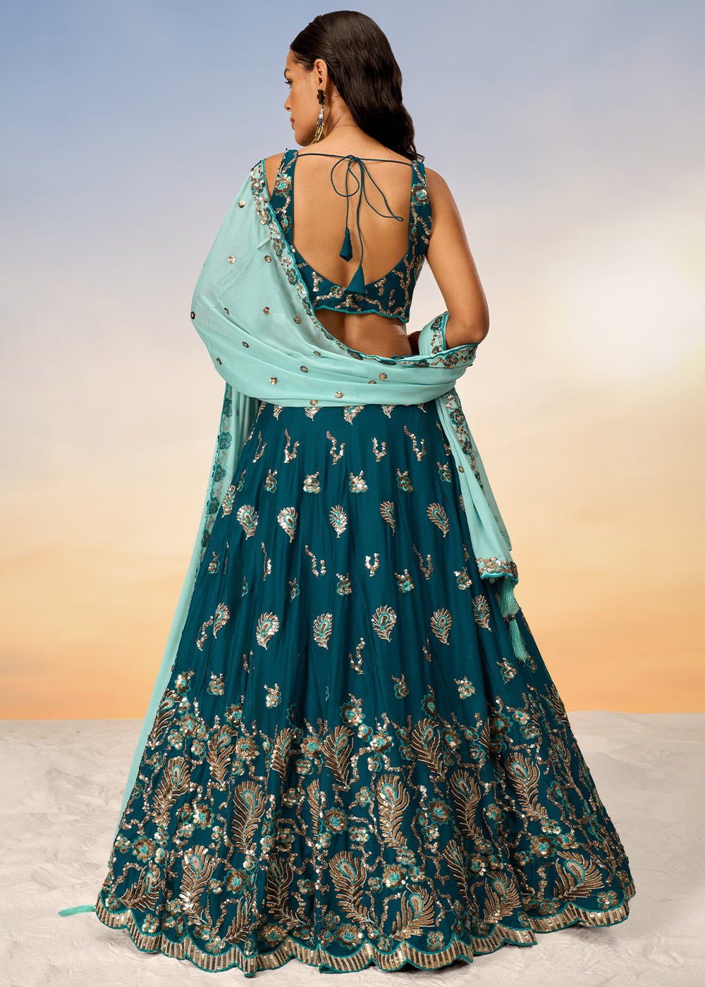 Teal Blue Georgette Lehenga Choli Adorned with Sequins Embroidery