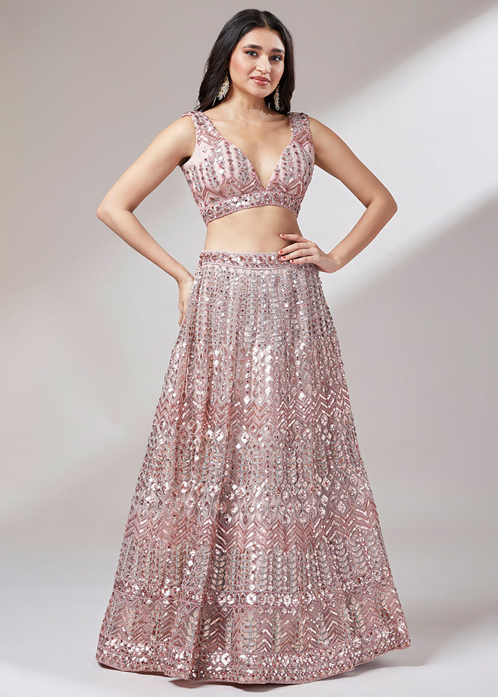 Rose Gold Pink Net Lehenga Choli Highlighted with Sequins Embroidery & Net Mirror work