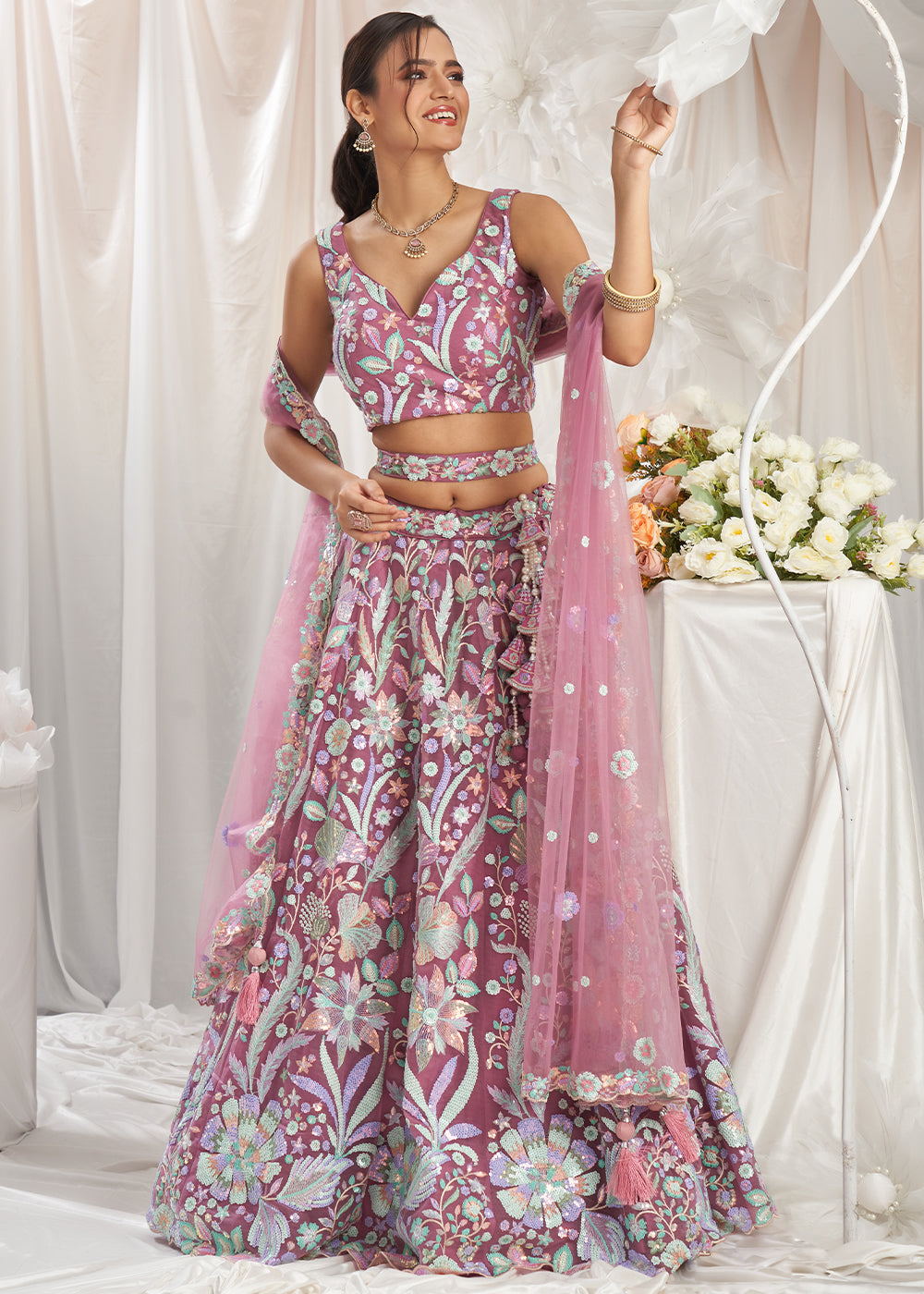 Wildberry Purple Net Lehenga Choli Adorned with Sequins Embroidery Work