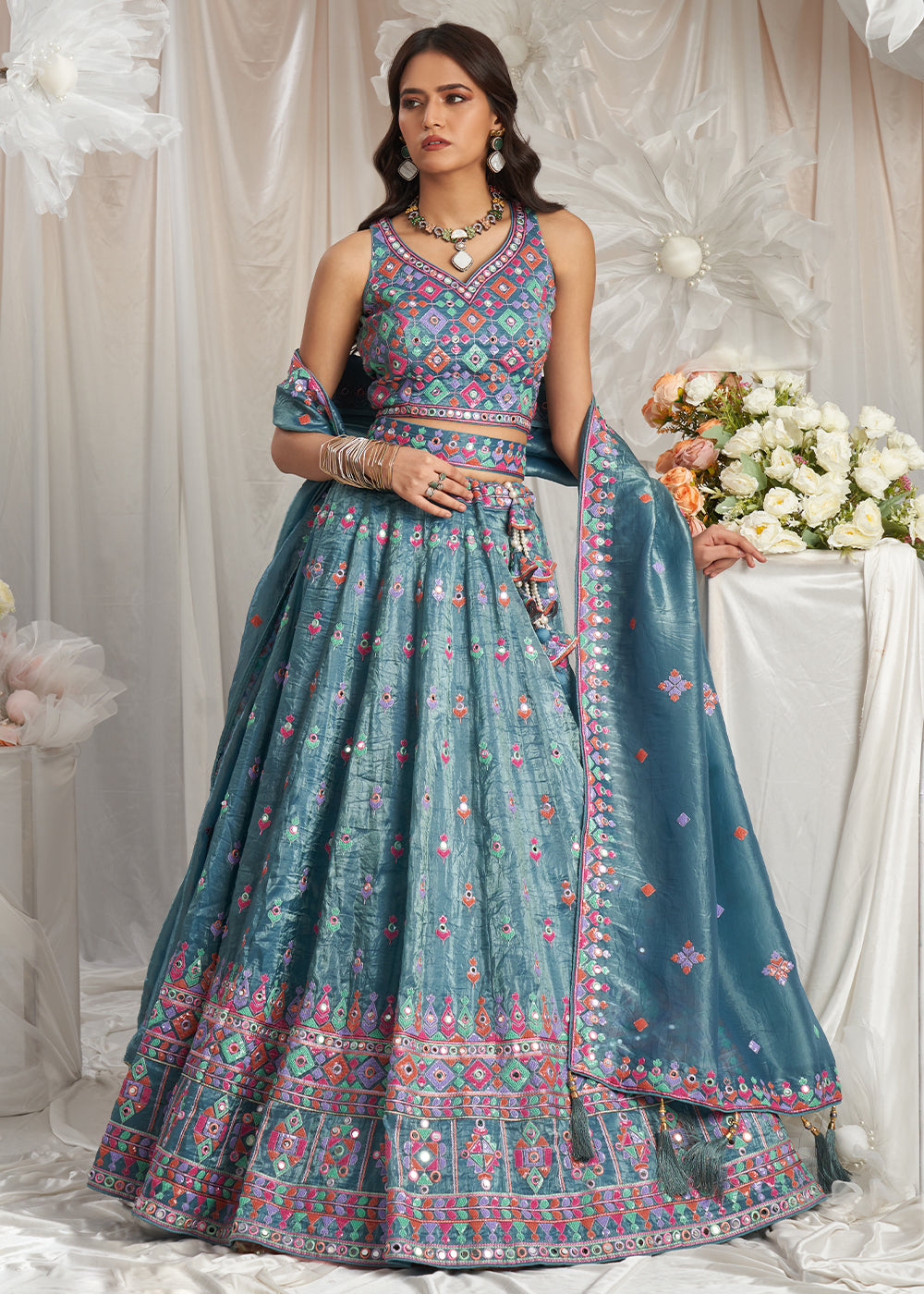 Teal Blue Organza Lehenga Choli Adorned with Sequins & Mirror Embroidery