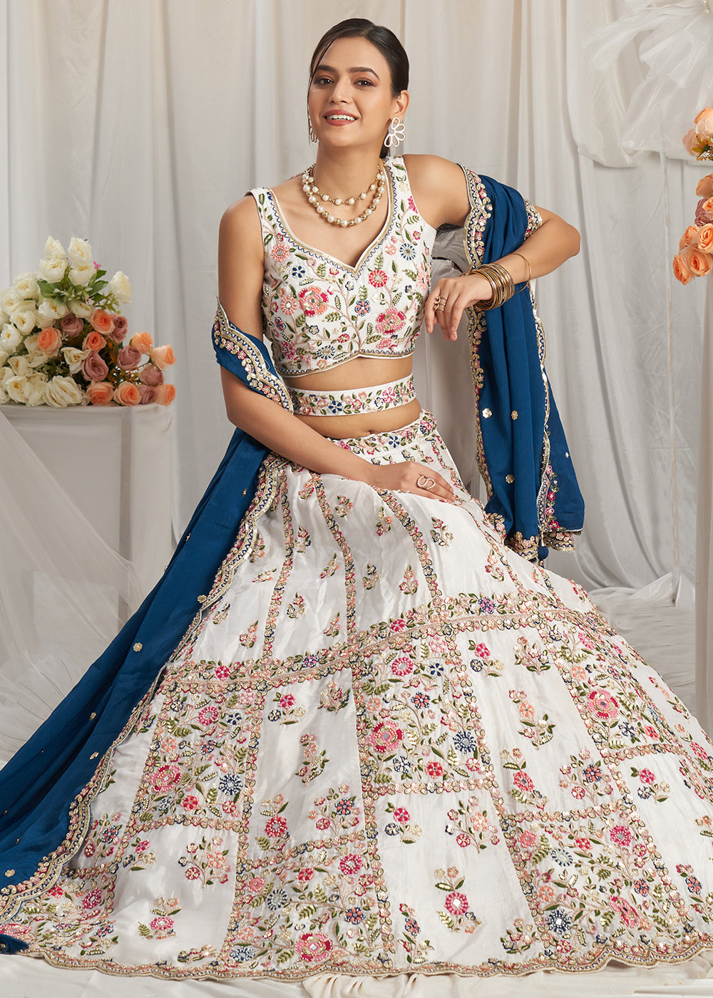 Rice White Georgette Lehenga Choli Adorned with Moti & Sequins Embroidery Work