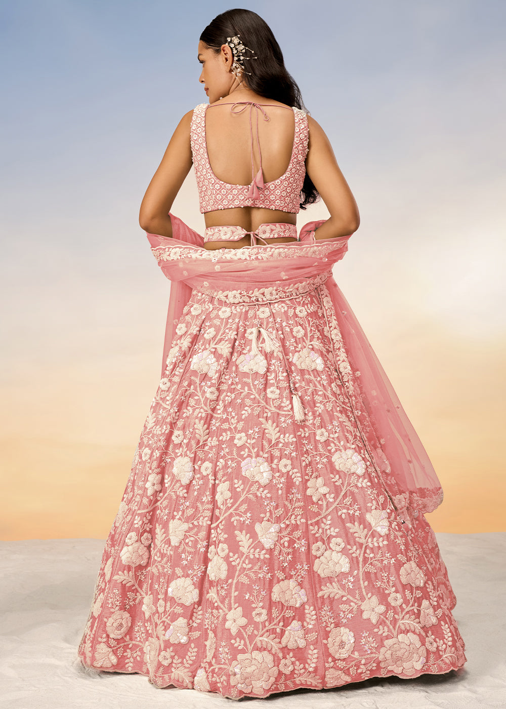 Peach Pink Georgette Lehenga Choli Highlighted with Sequins & Zarkan Embroidery