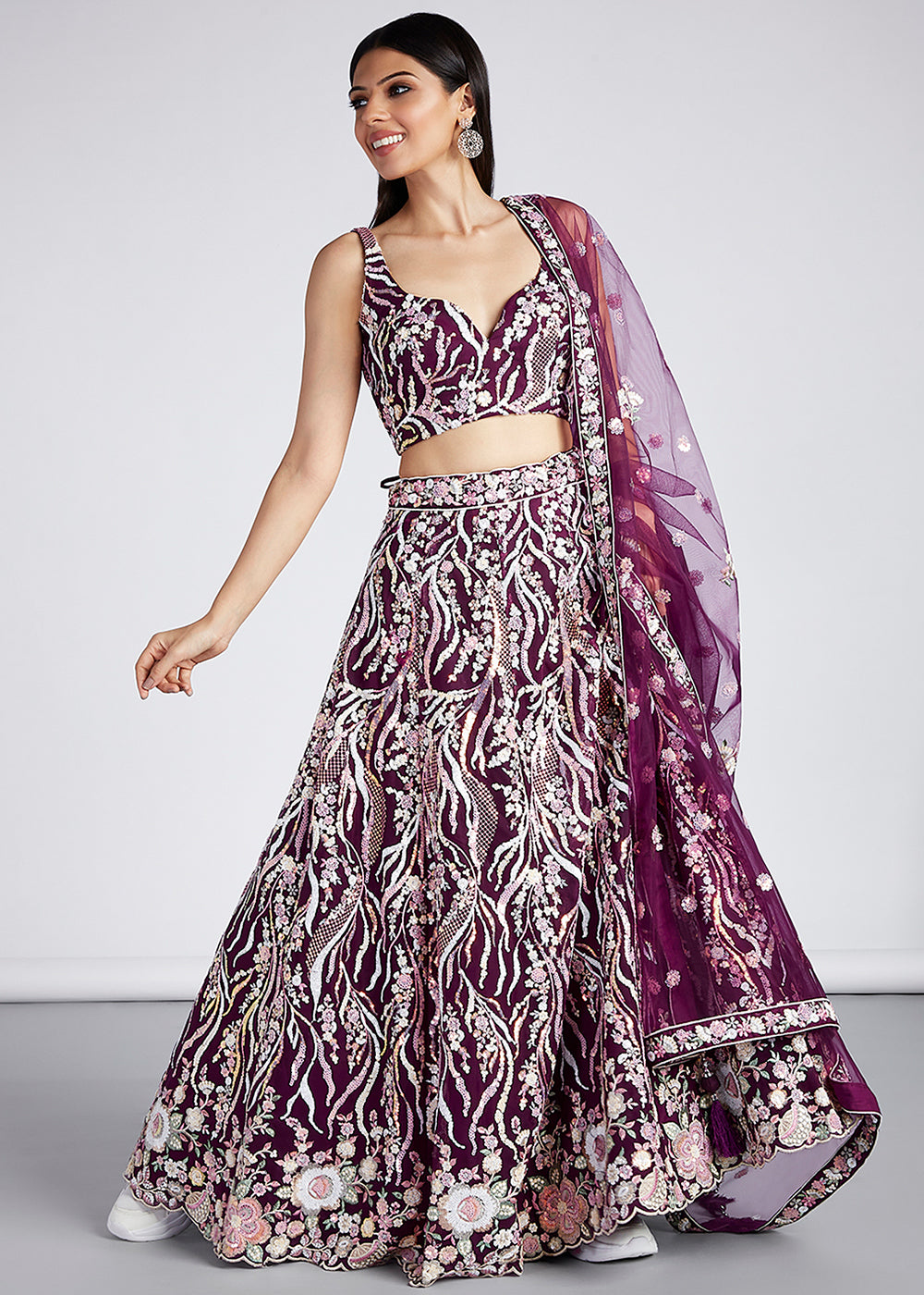 Burgundy Purple Net Lehenga Choli Highlighted with Sequins & Thread Embroidery