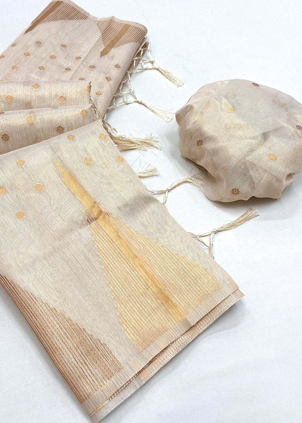 Pearl White Zari Tissue Silk Saree Handcrafted to Perfection