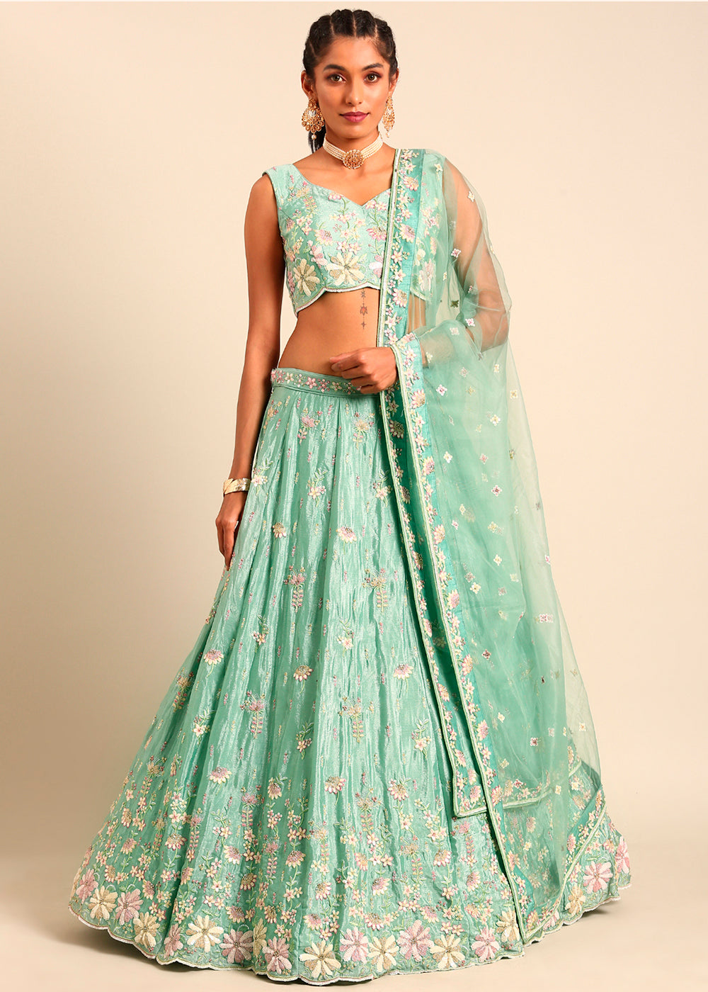 Pistachio Green Net Lehenga Choli Highlighted with heavy Sequins Embroidery