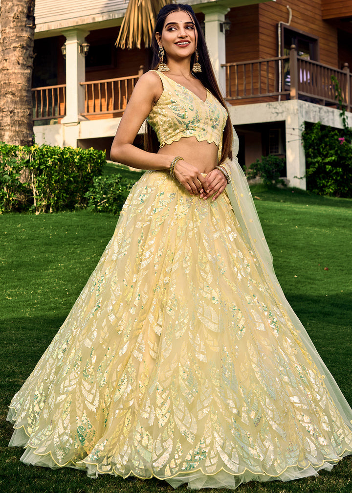 Light Yellow Soft Net Lehenga Choli having Sequins & Thread Embroidery work