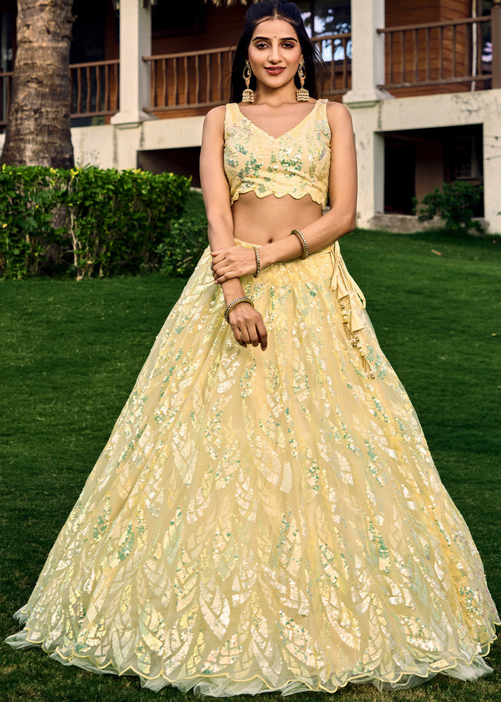 Light Yellow Soft Net Lehenga Choli having Sequins & Thread Embroidery work