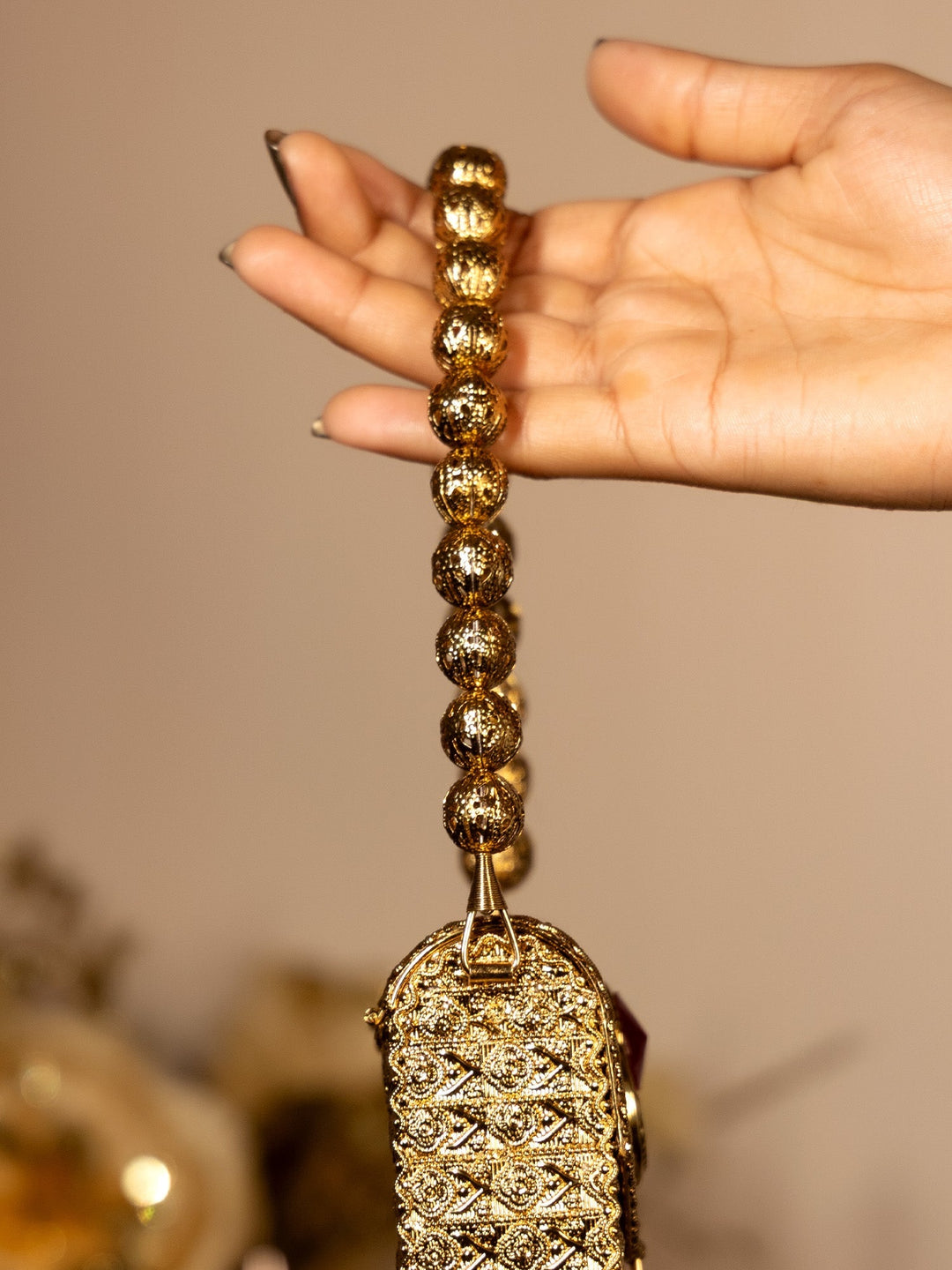 Kiran Ruby Golden Mobile Pouch