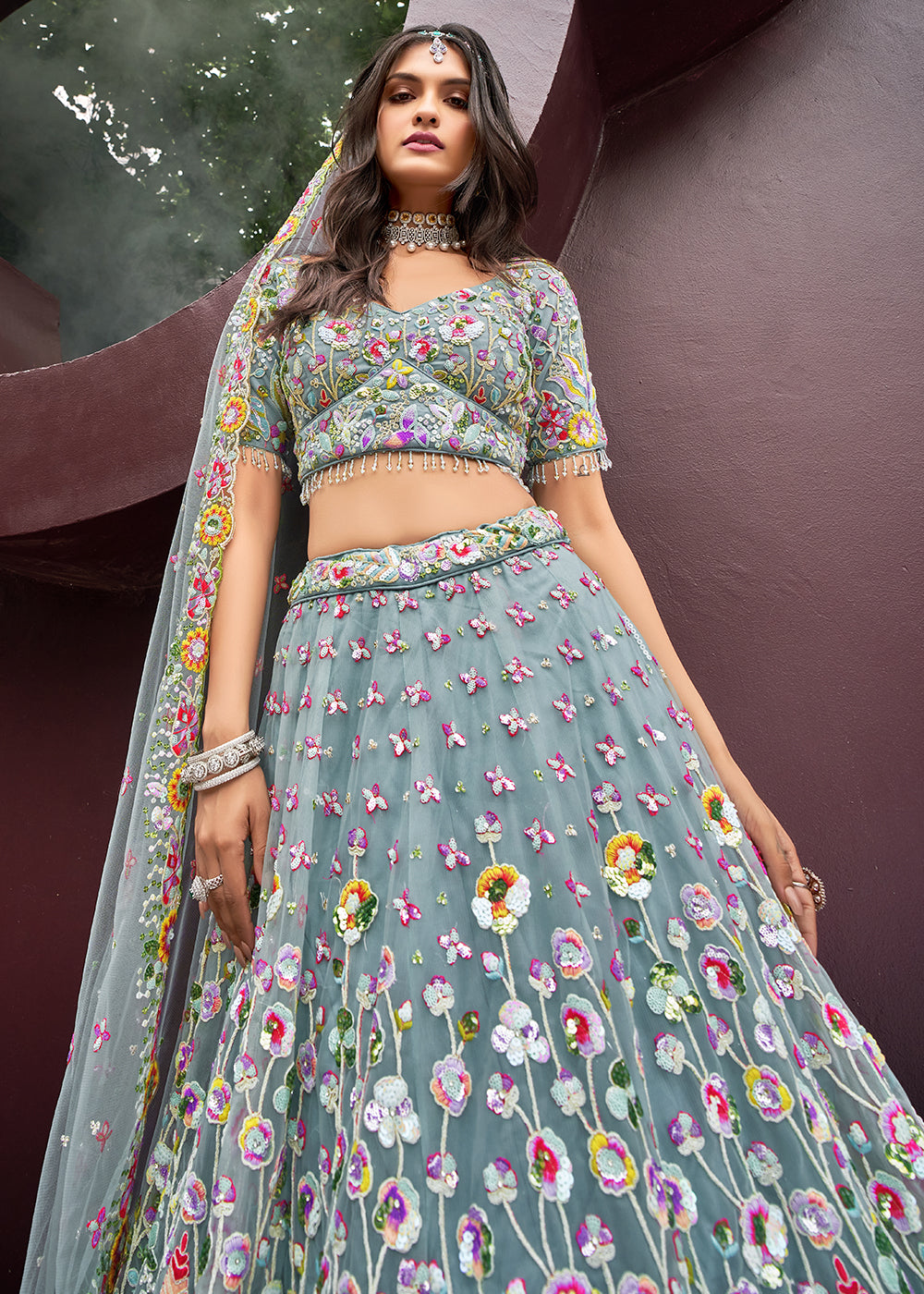 Carnation Blue Net Lehenga Choli Adorned with Cut-Dana & Handwork Embroidery: The Bride's Edit