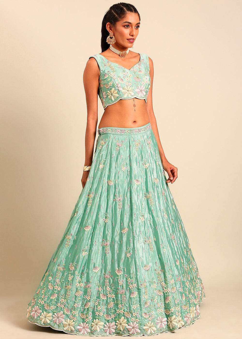 Pistachio Green Net Lehenga Choli Highlighted with heavy Sequins Embroidery