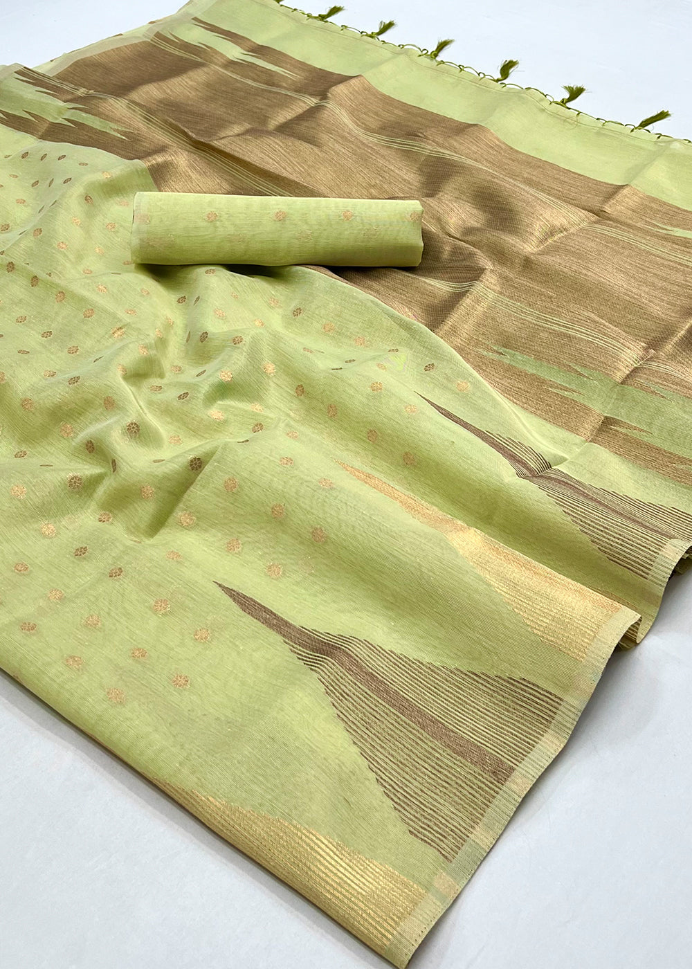 Tea Green Zari Tissue Silk Saree Handcrafted to Perfection