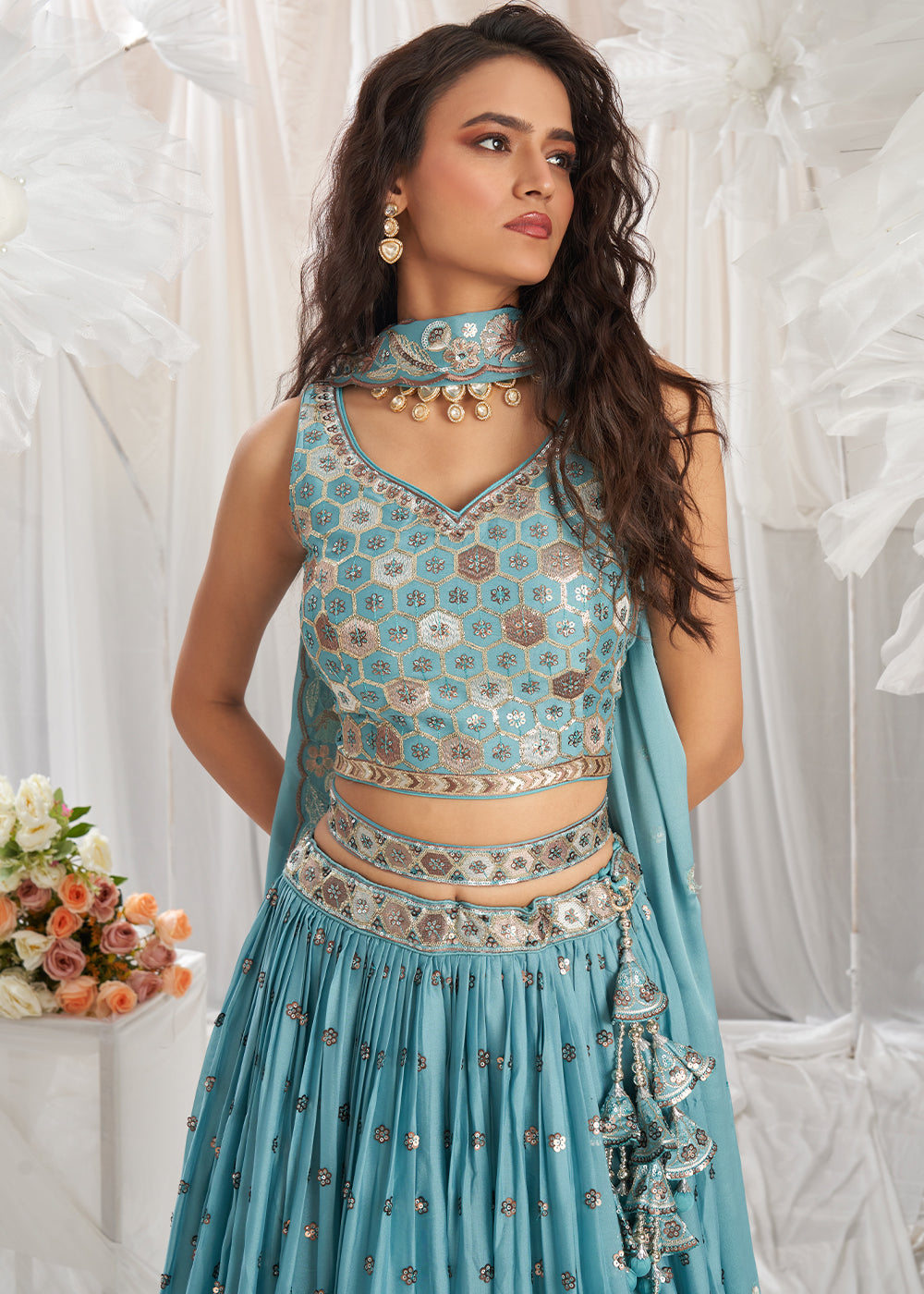 Turquoise Blue Georgette Lehenga Choli Adorned with Sequins Work