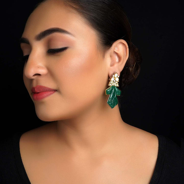 Diya Green Rhodium Plated Carved Stone Kundan Earrings