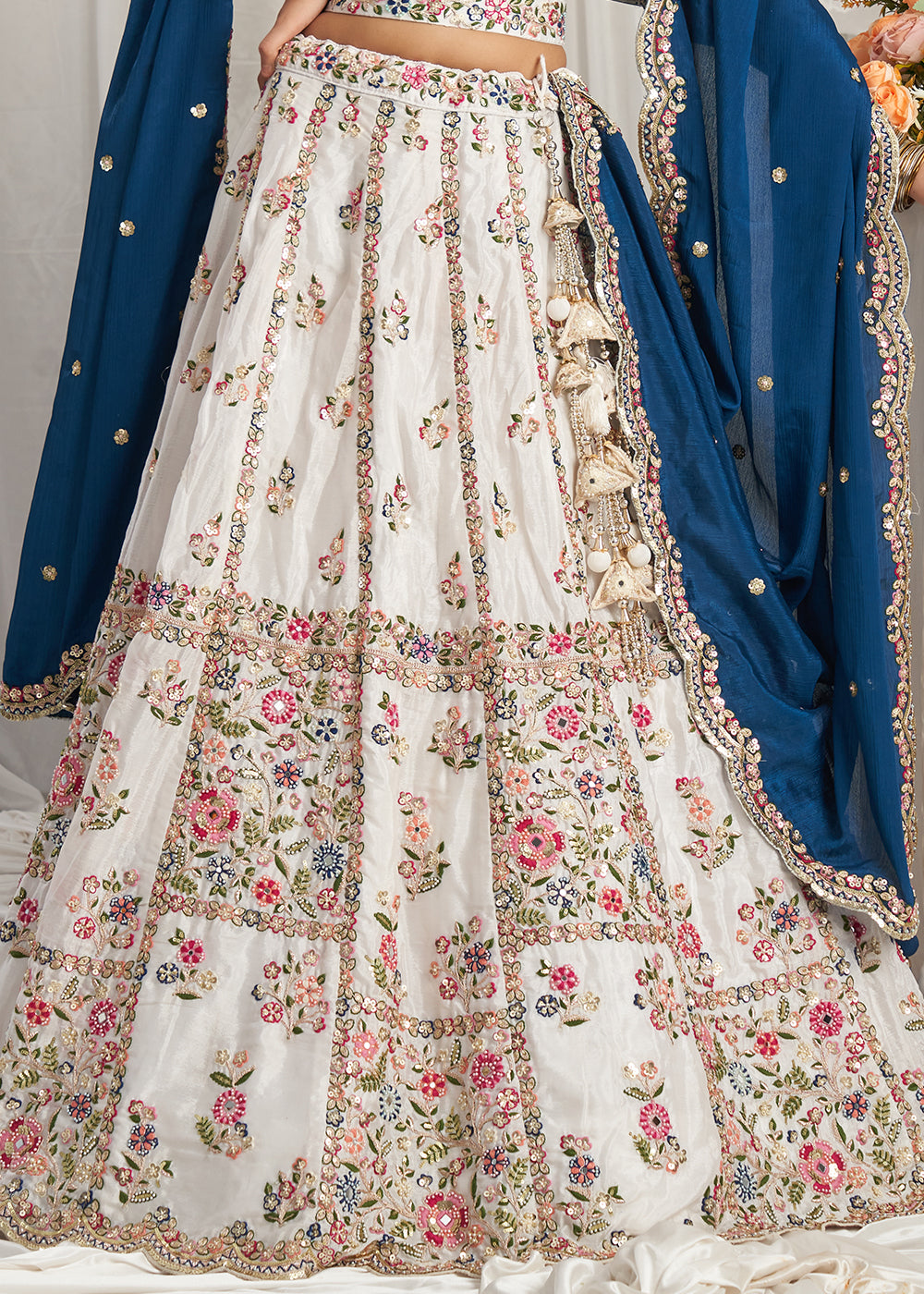 Rice White Georgette Lehenga Choli Adorned with Moti & Sequins Embroidery Work