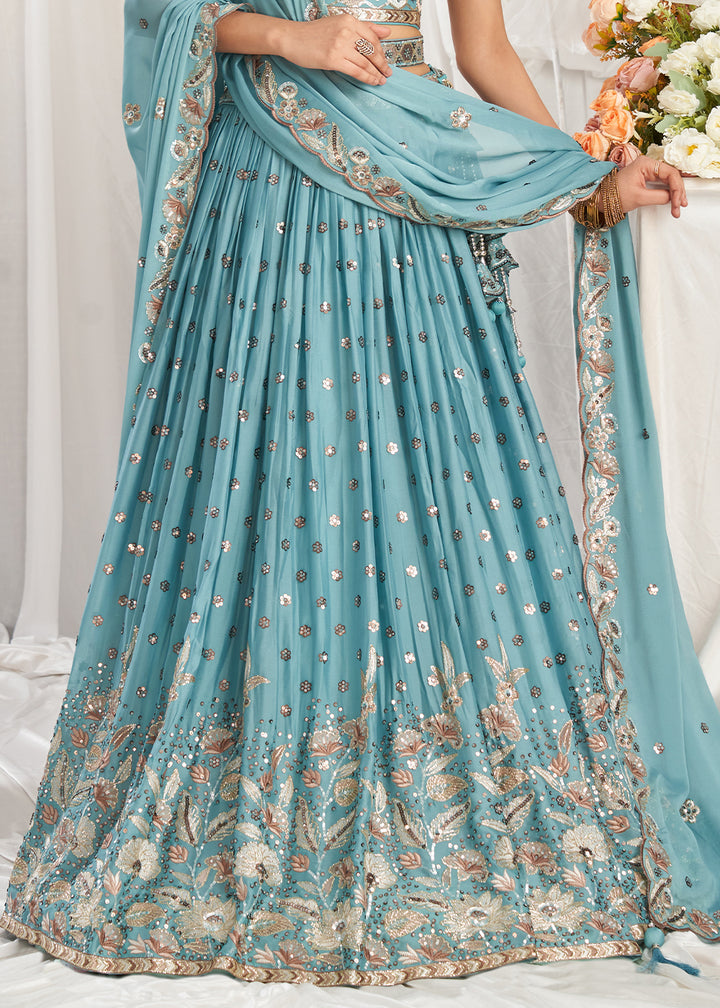 Turquoise Blue Georgette Lehenga Choli Adorned with Sequins Work