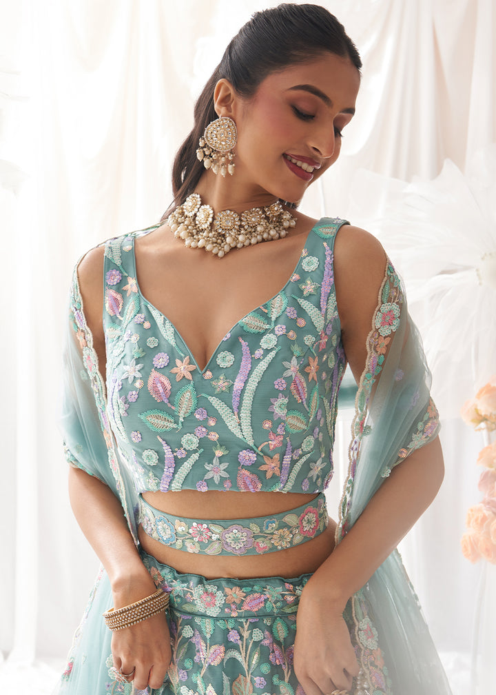 Greenish Blue Net Lehenga Choli Adorned with Sequins Embroidery Work