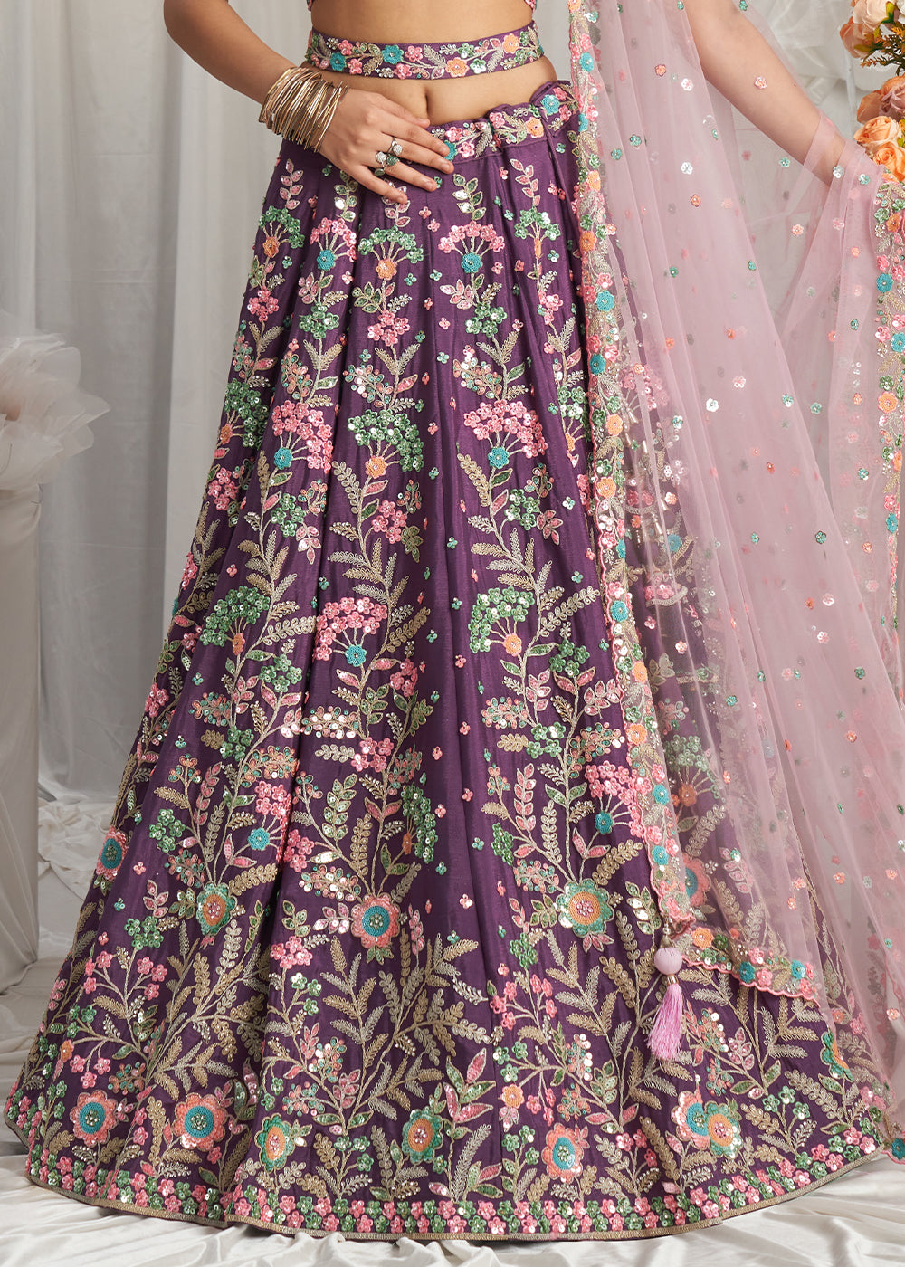 Pomegranate Purple Georgette Lehenga Choli Adorned with Sequins Embroidery