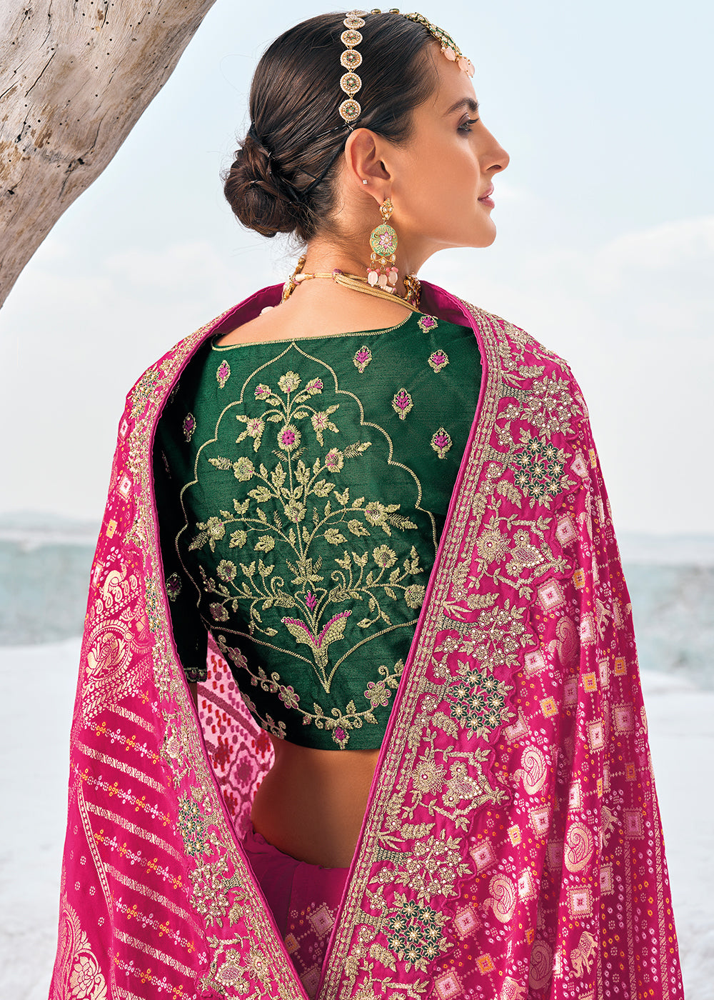 Strawberry Pink Georgette Silk Saree Featuring Zari Weave, Bandhani, and Patola Design