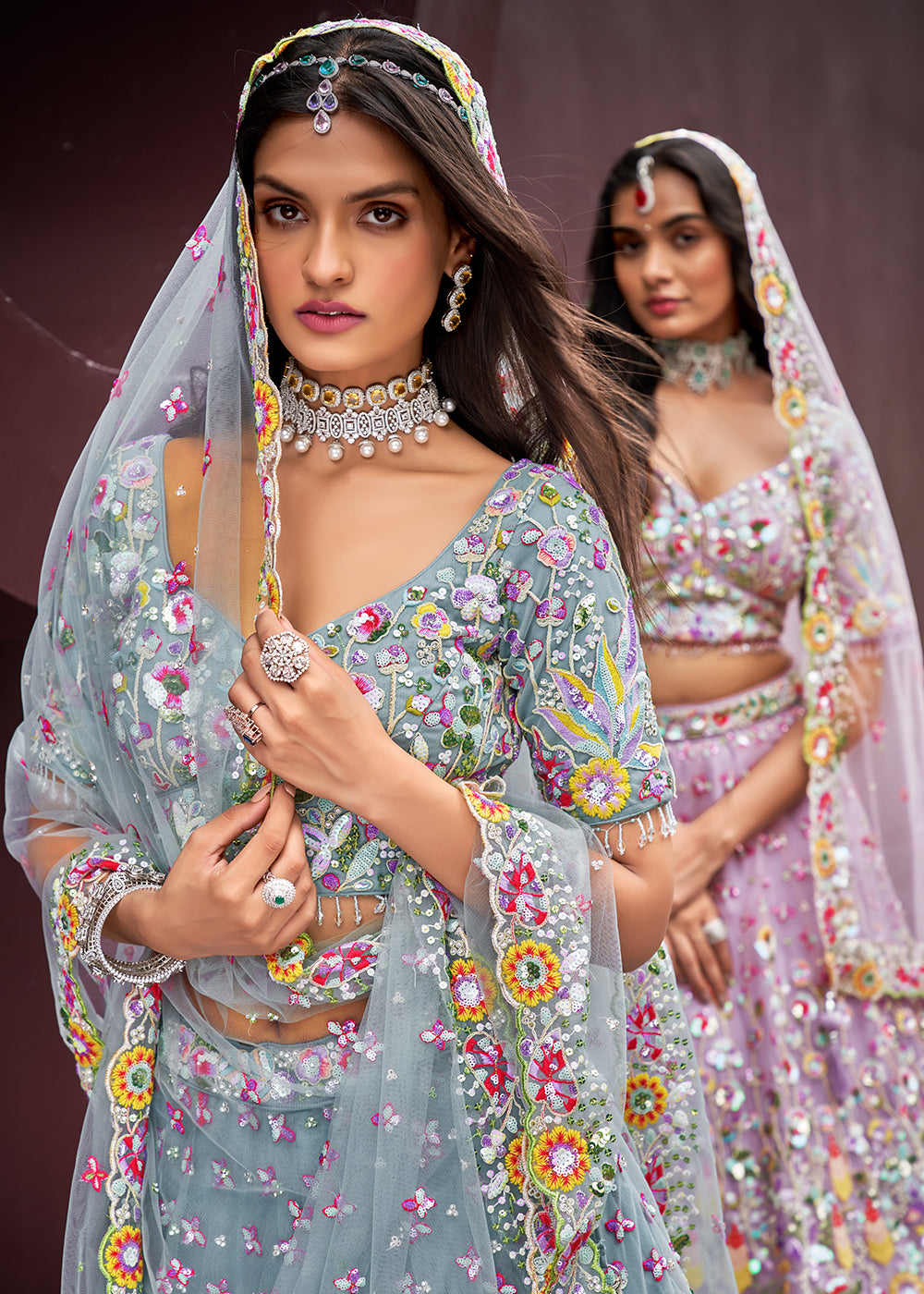 Carnation Blue Net Lehenga Choli Adorned with Cut-Dana & Handwork Embroidery: The Bride's Edit