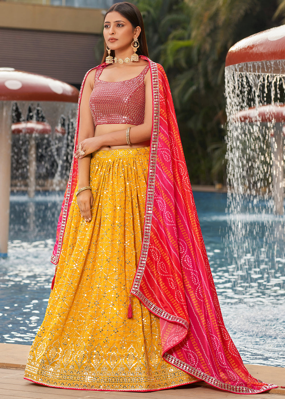 Saffron Yellow & Pink Georgette Lehenga Choli with Sequins,Zari & Thread Embroidery work