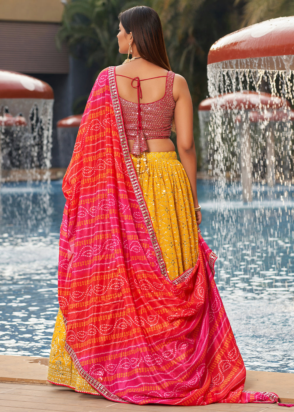 Saffron Yellow & Pink Georgette Lehenga Choli with Sequins,Zari & Thread Embroidery work