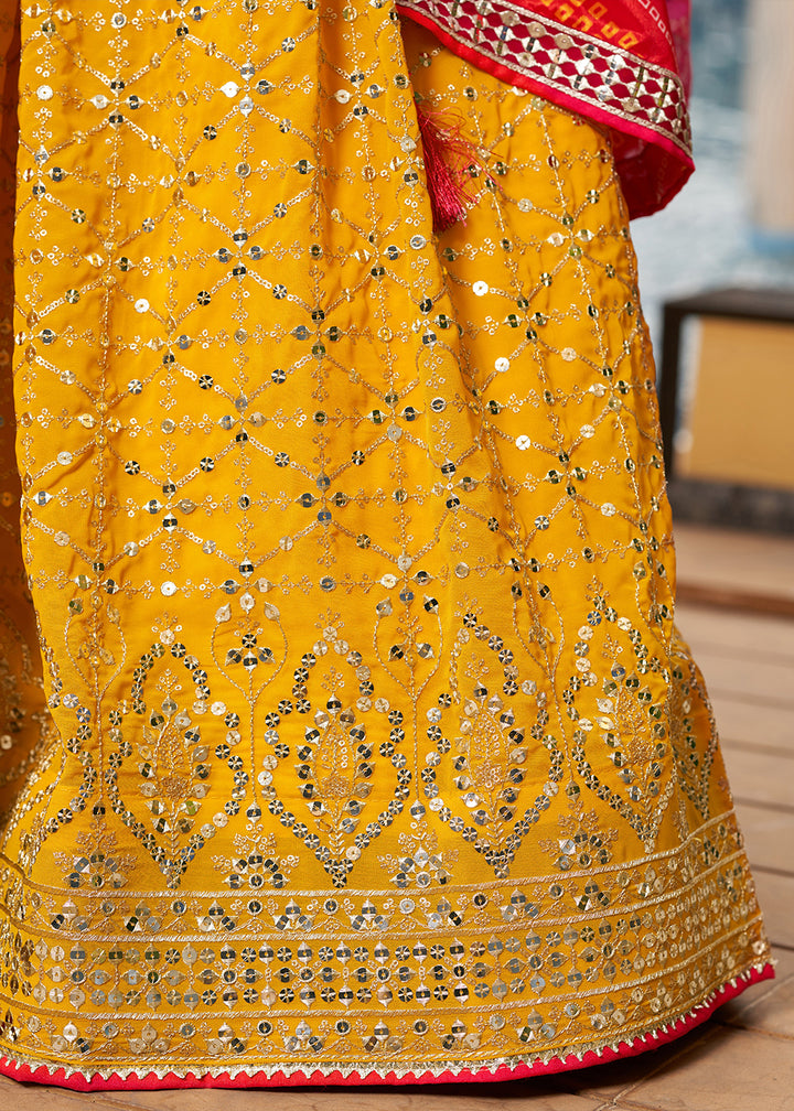 Saffron Yellow & Pink Georgette Lehenga Choli with Sequins,Zari & Thread Embroidery work