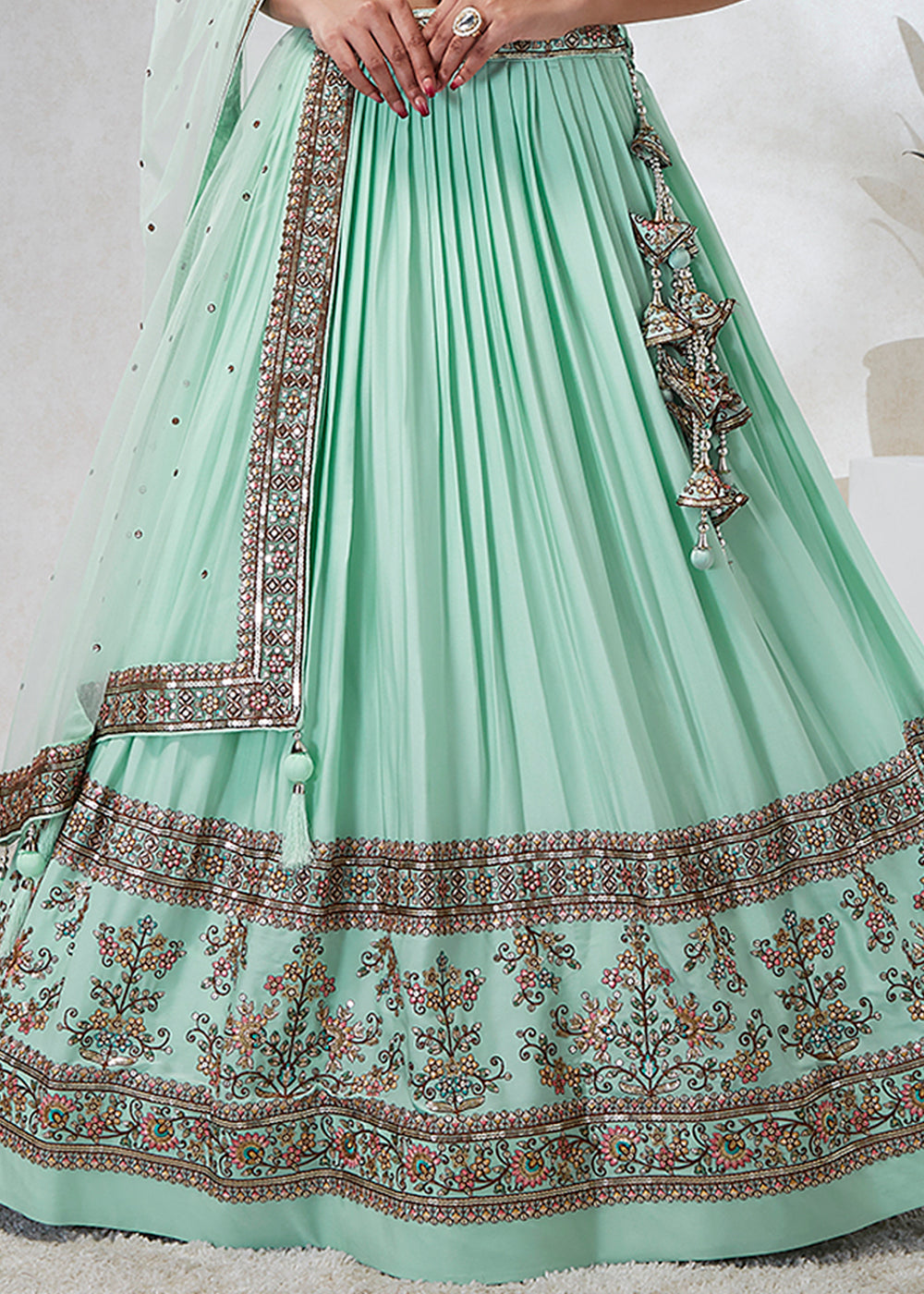 Mint Green Georgette Lehenga Choli Highlighted with Sequins & Thread Embroidery