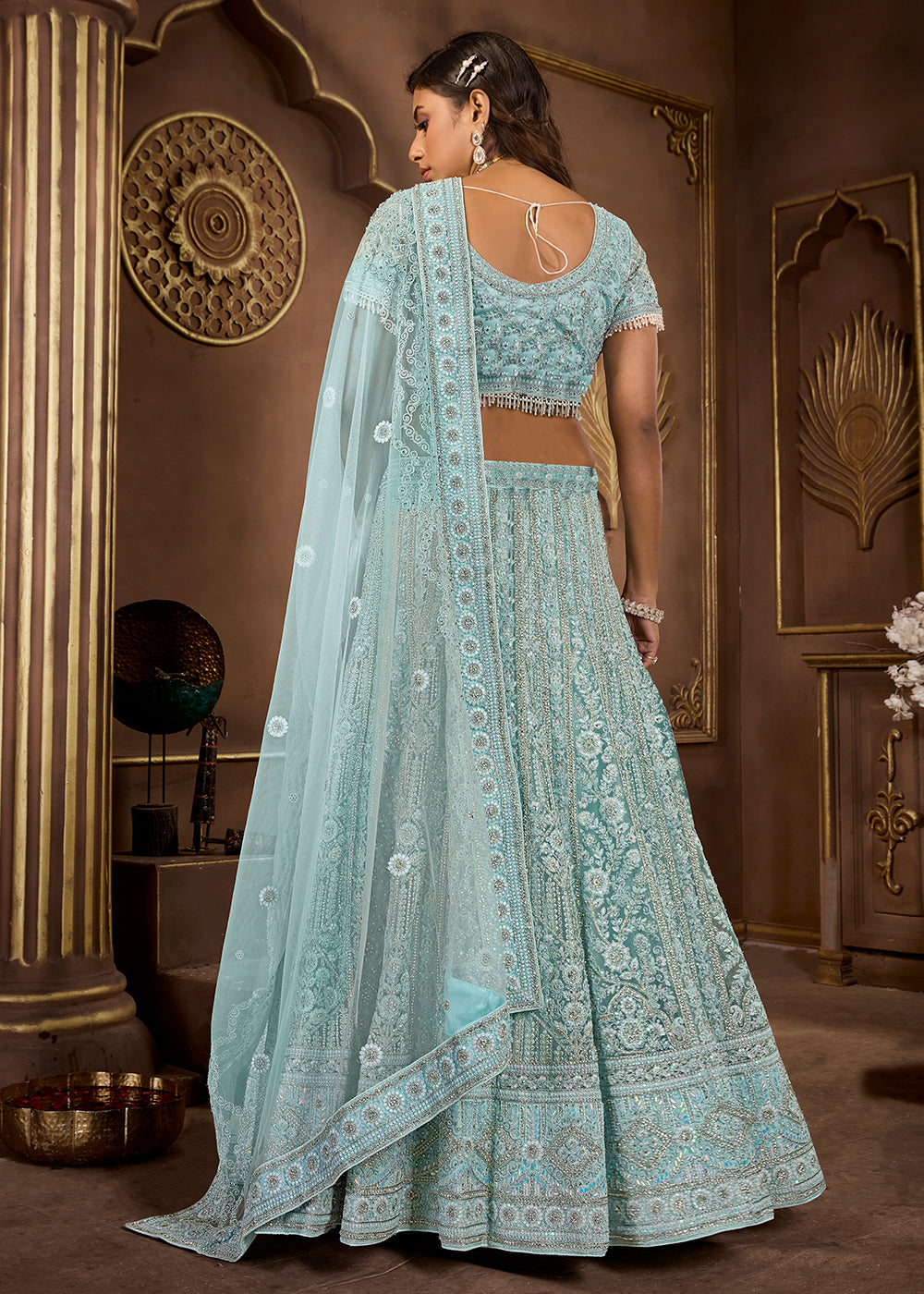 Sky Blue Luxurious Net Lehenga with Zarkan Embellishments