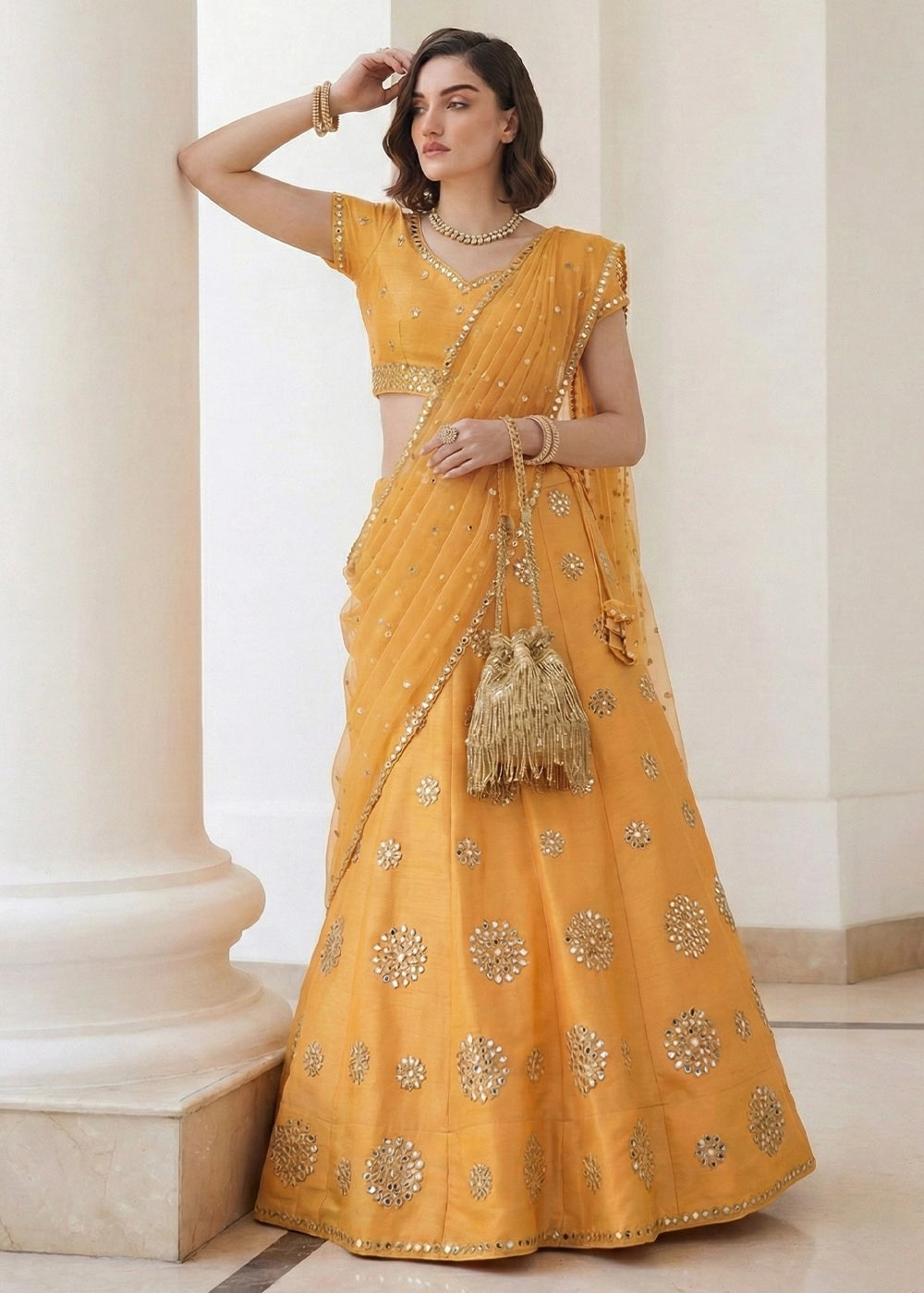 Buttercup Yellow Heavy Embroidered Silk Lehenga Choli with Zari & Sequin Work
