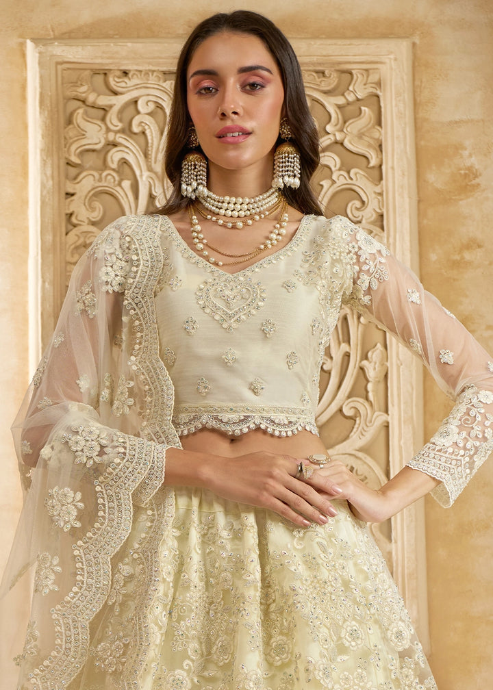 Cream White Net Lehenga Choli with Handcrafted Cording, Thread, and Stone Work