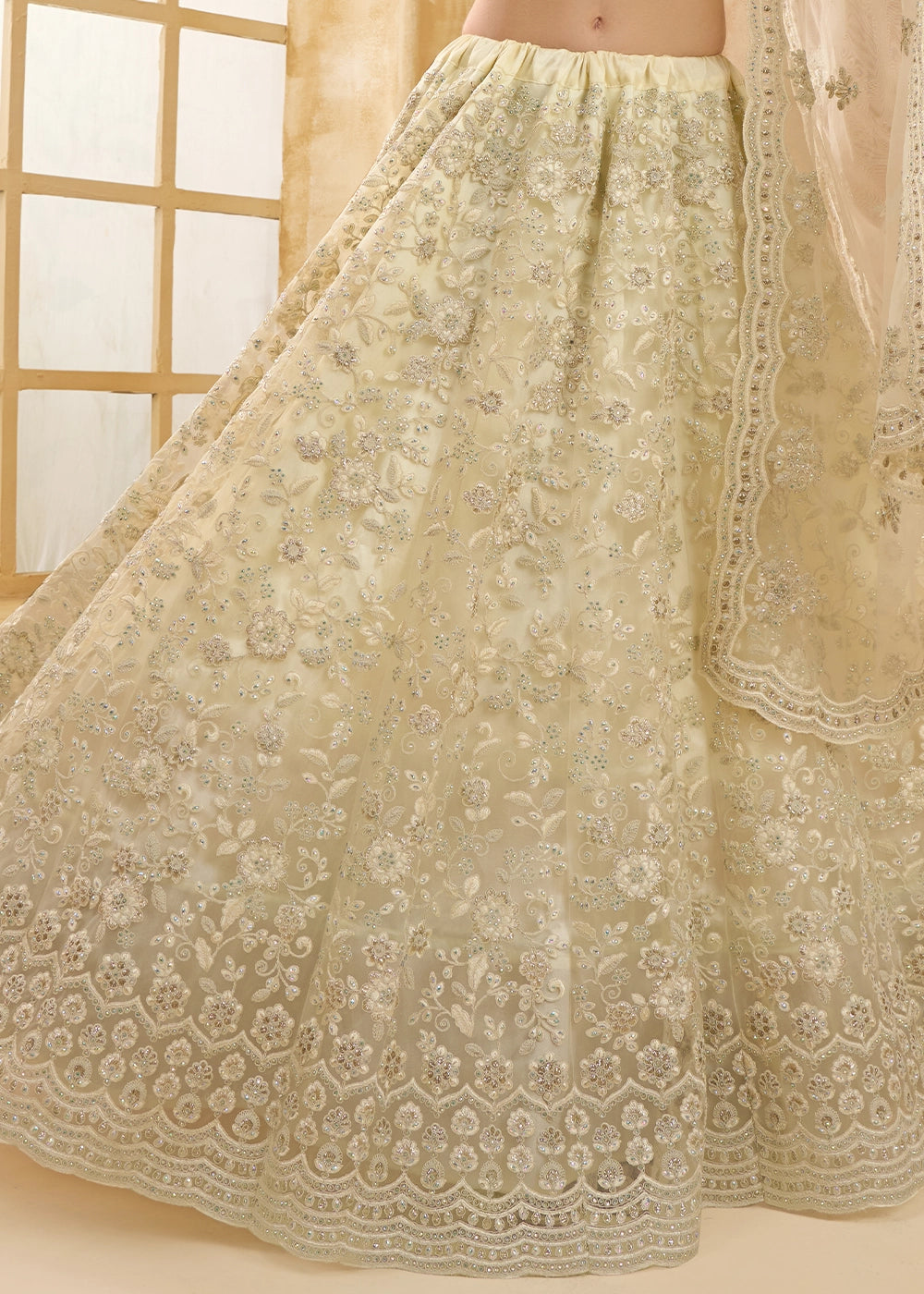 Pearl White Net Lehenga Choli with Handcrafted Cording, Thread, and Stone Work