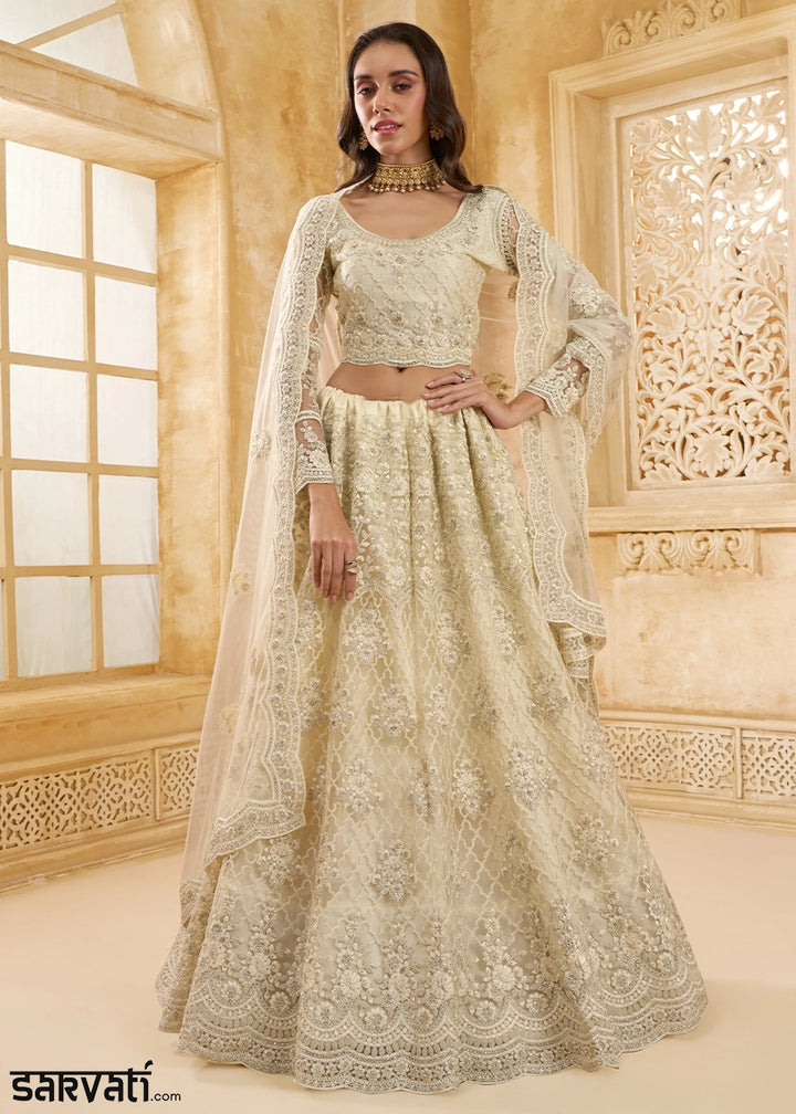 Parchment White Net Lehenga Choli with Handcrafted Cording, Thread, and Stone Work