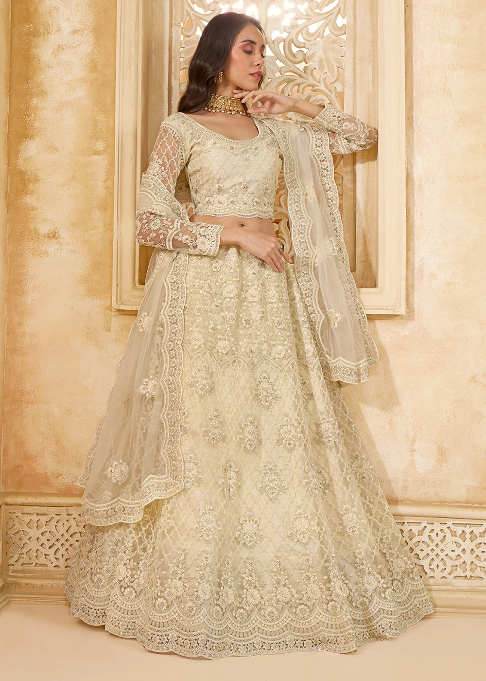 Parchment White Net Lehenga Choli with Handcrafted Cording, Thread, and Stone Work