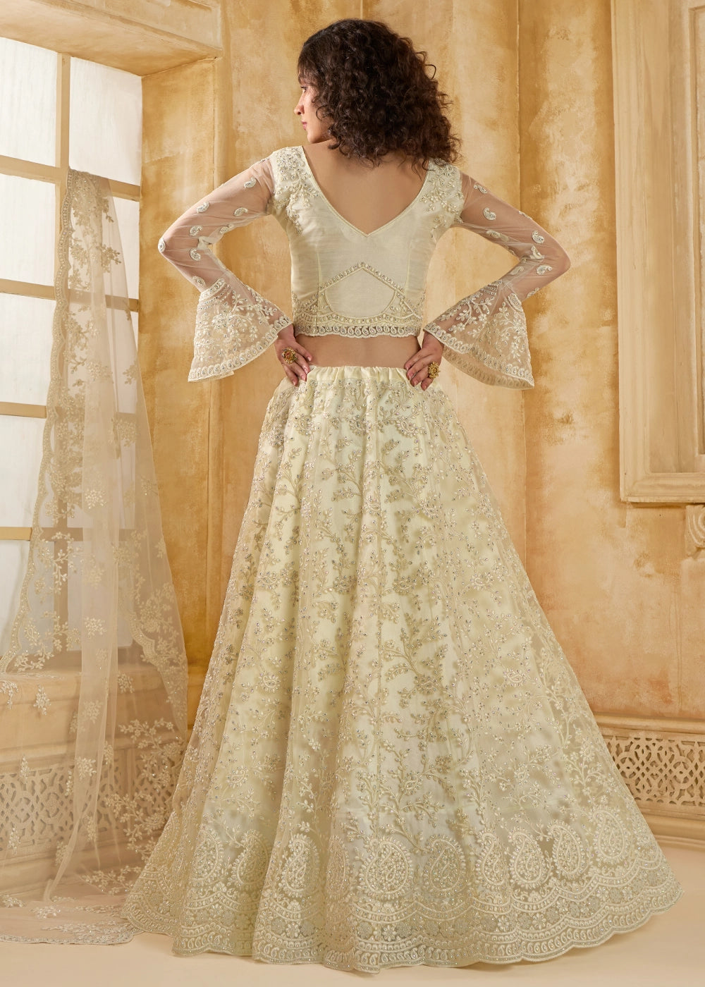 Rice White Net Lehenga Choli with Handcrafted Cording, Thread, and Stone Work