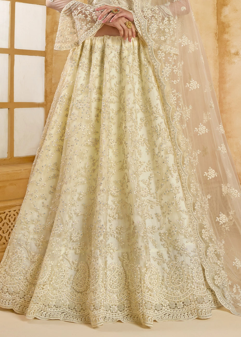 Rice White Net Lehenga Choli with Handcrafted Cording, Thread, and Stone Work